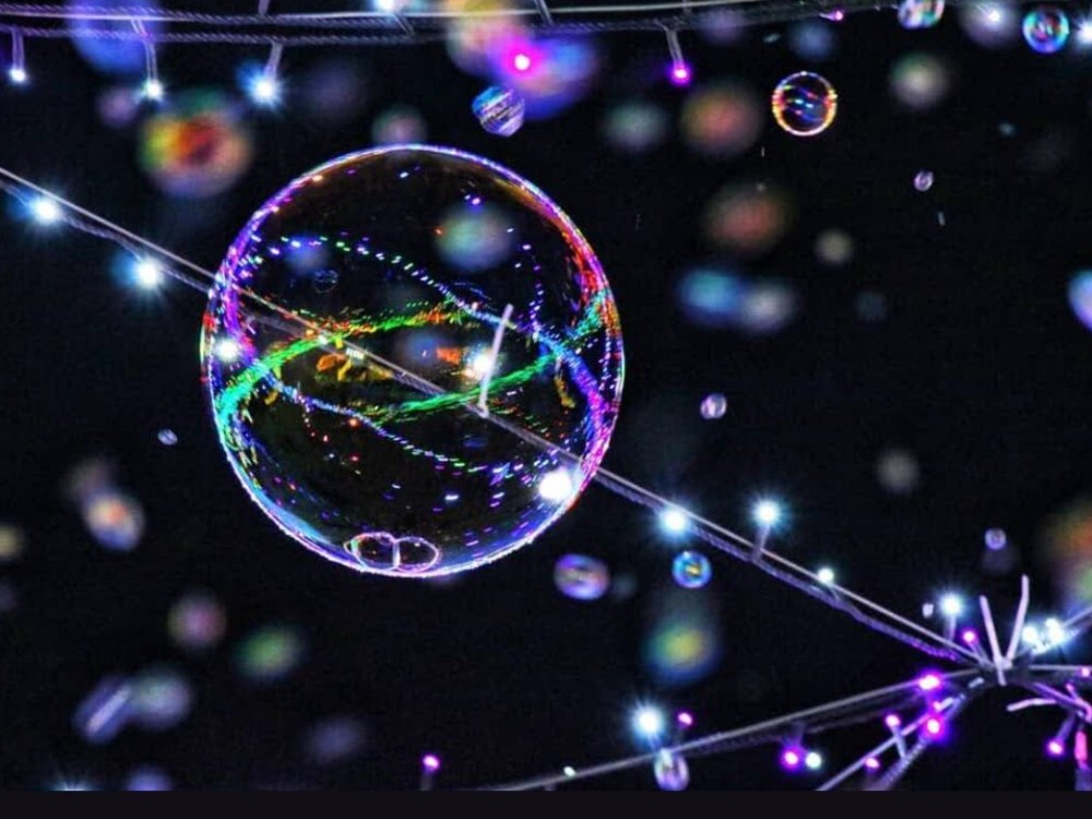 Night bubble show keeping visitors at an evening event